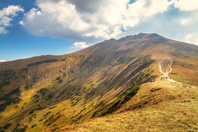 Mountainous landscape with hills and valleys in autumn season