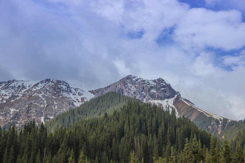 Mountains with ice peaks and cloudy sky, Central Tien-Shan, Kazakhstan royalty free stock photo Mountains with ice peaks and cloudy sky, Central Tien-Shan, Kazakhstan royalty free stock photo