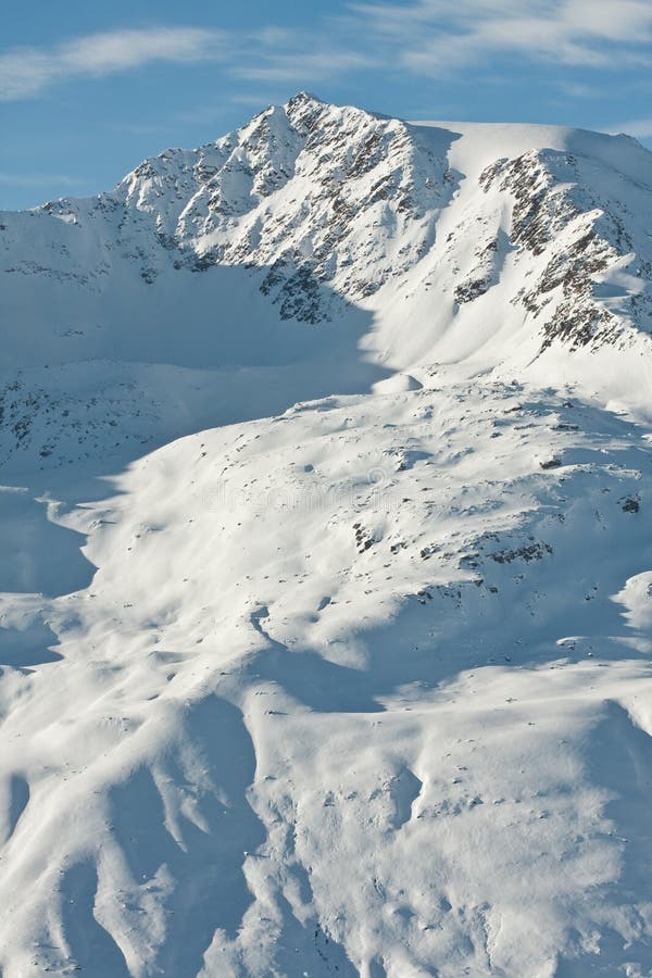 Mountains under snow in the winter.