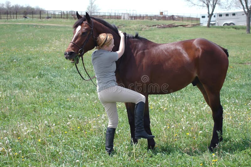 Mounting a horse