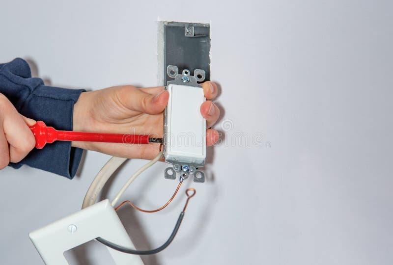 Mounting and Installing a Wall Switch in a Drywall Stock Image Image