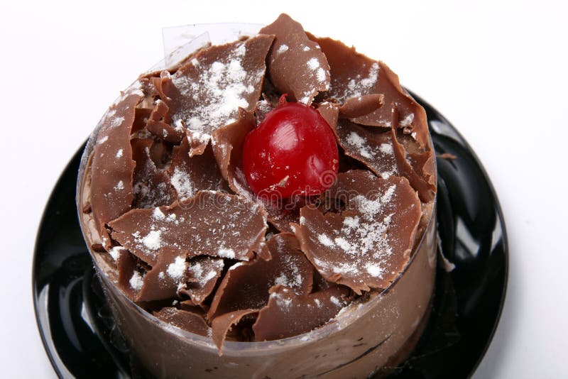 Portions of mousse decorated to serve well-chilled. Dessert portions stock images, royalty-free photos and pictures