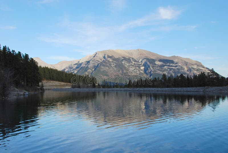 Moutain and its shadow in lake