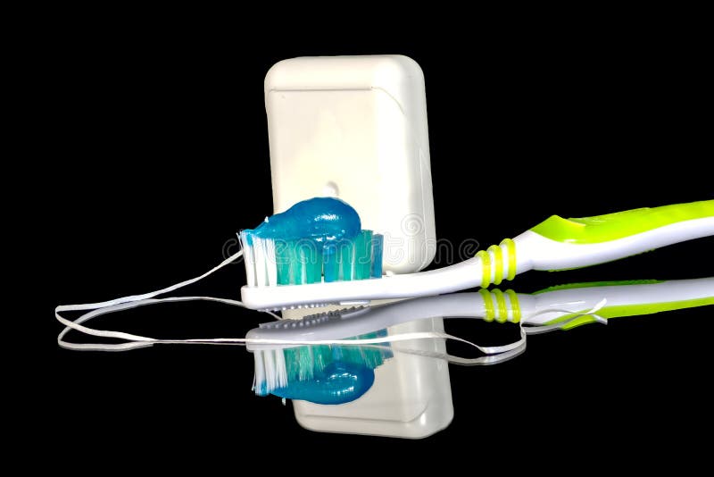 Mouth Health with the Right Toothpaste and Dental Floss Stock Image