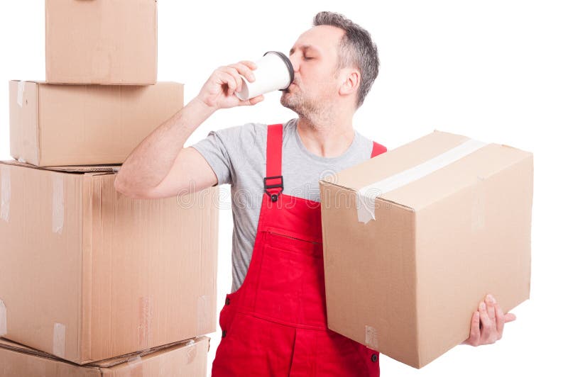 Mover man holding box and drinking coffee royalty free stock photography