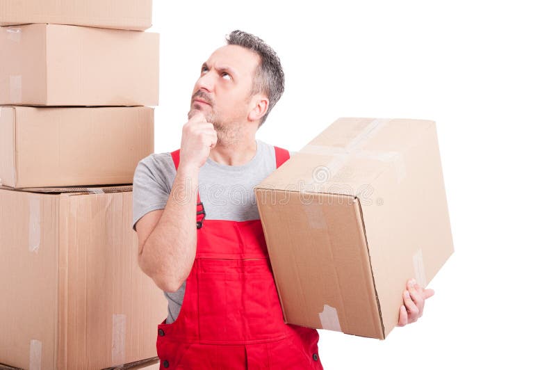 Mover man holding cardboard box making thinking gesture royalty free stock photos