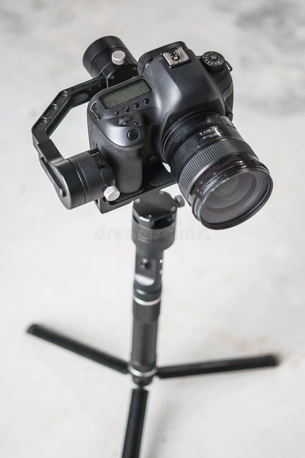 Movie Camera on Tripod. Professional Digital Equipment Recording in