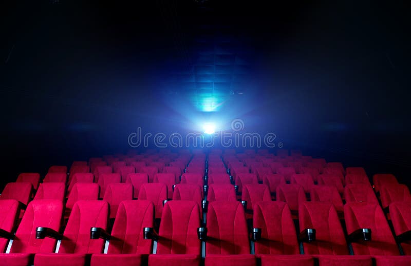 Movie theatre hall with red seats