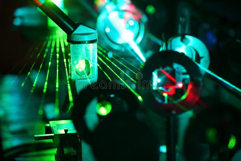 Movement of microparticles by beams of laser in lab. Movement of microparticles by beams of laser in lab