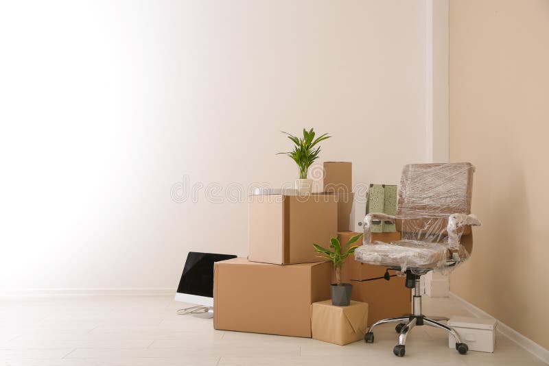 Moving Boxes and Furniture in Office. Space for Text Stock Photo Image of packing, empty