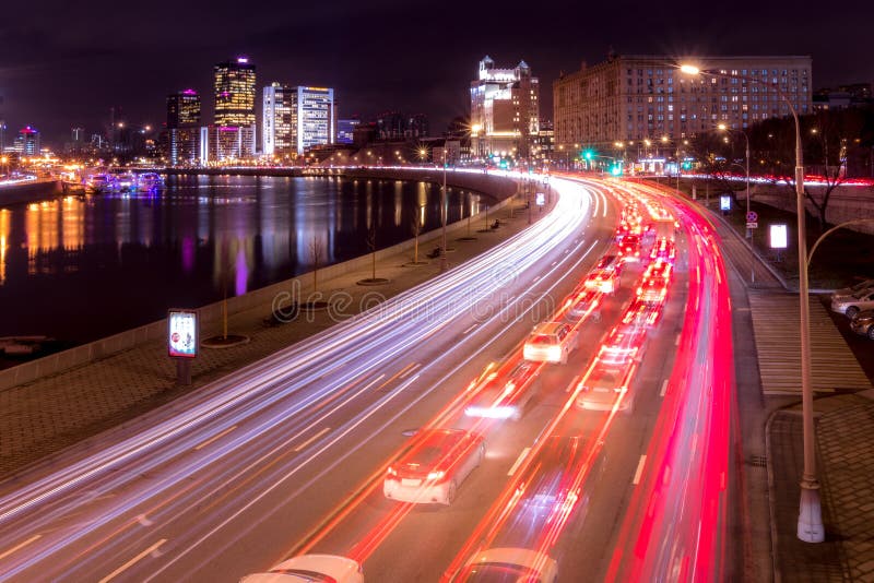 Moving car with blur light through city at night. Moscow