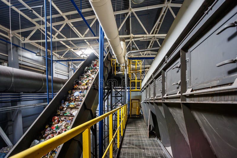 Moving conveyor transporter on Modern waste recycling processing plant. Separate and sorting garbage collection. Recycling and