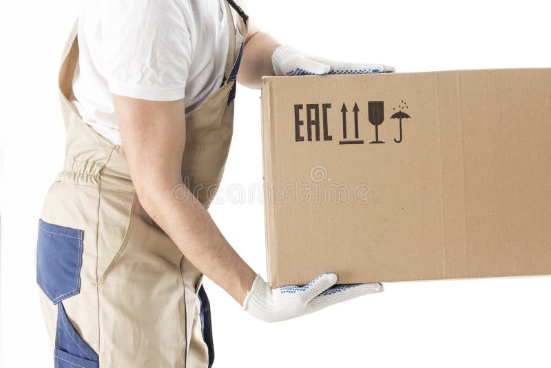Moving service worker holds cardboard box close-up on white background. Relocation man in uniform with box royalty free stock images
