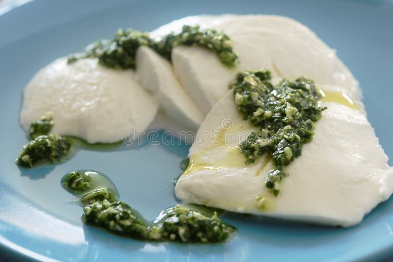 Mozzarella with Pesto Sauce Stock Photo Image of sauce, mediterranean
