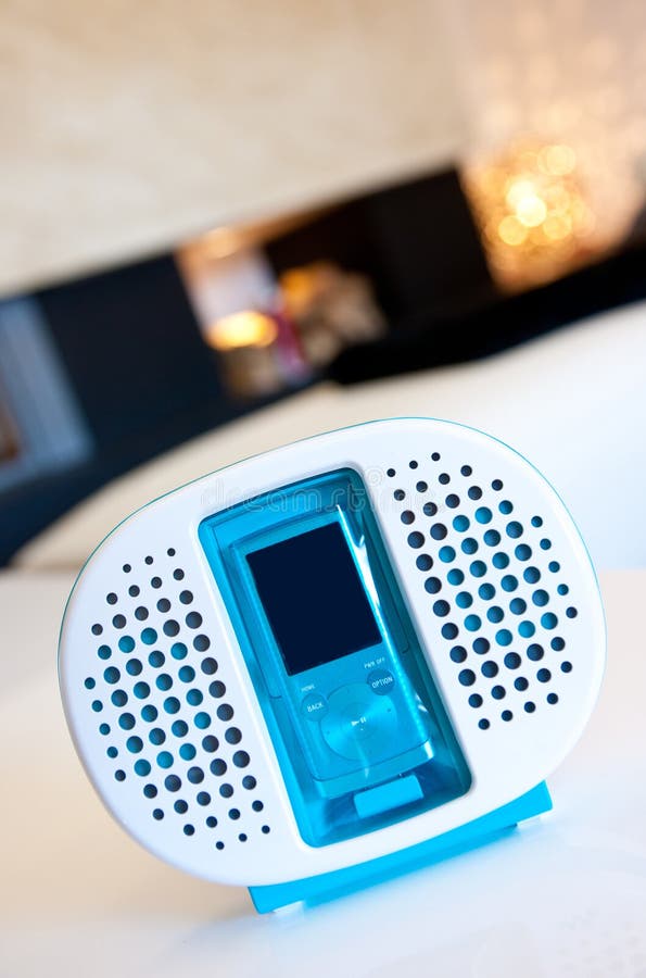 Mp3 player on stand stock photo. Image of music, white 18629372