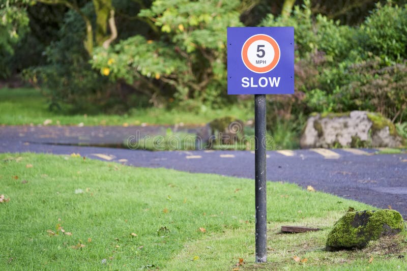 5 Mph Speed Limit Road Sign at Public Park5 Mph Speed Limit Road Sign at Public Park Stock Photo