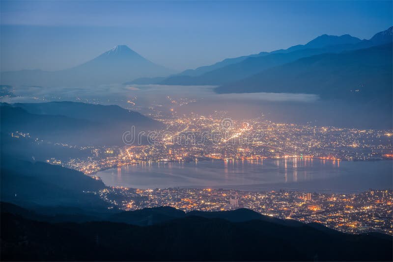 Mt.Fuji and Suwa lake in early morning stock images Mt.Fuji and Suwa lake in early morning stock images