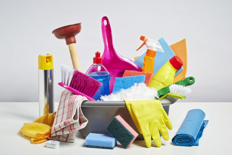 House cleaning products pile. Household chore concept on white background. House cleaning products pile. Household chore concept on white background