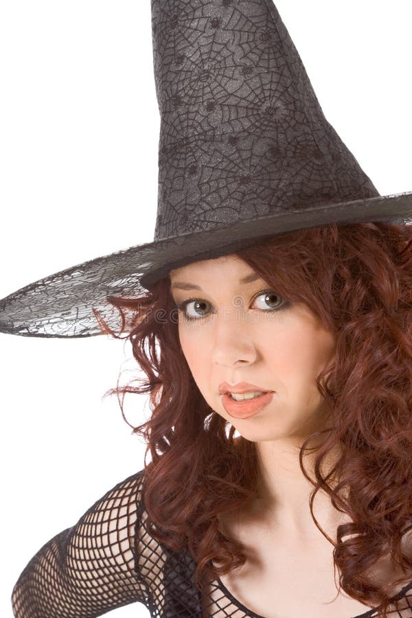 Muchacha adolescente aburrida de la pista leída en el sombrero de Víspera de Todos los Santos imagenes de archivo Muchacha adolescente aburrida de la pista leída en el sombrero de Víspera de Todos los Santos imagenes de archivo