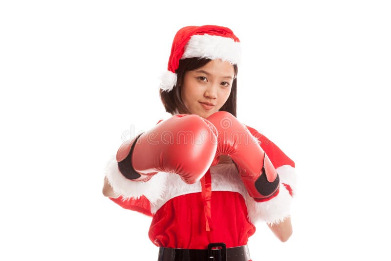 Muchacha asiática de Santa Claus de la Navidad con el guante de boxeo imágenes de archivo libres de regalías Muchacha asiática de Santa Claus de la Navidad con el guante de boxeo imágenes de archivo libres de regalías