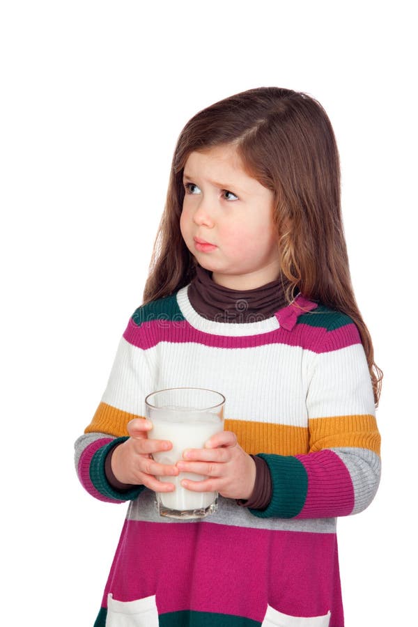 Muchacha bonita con un vidrio de leche foto de archivo libre de regalías Muchacha bonita con un vidrio de leche foto de archivo libre de regalías