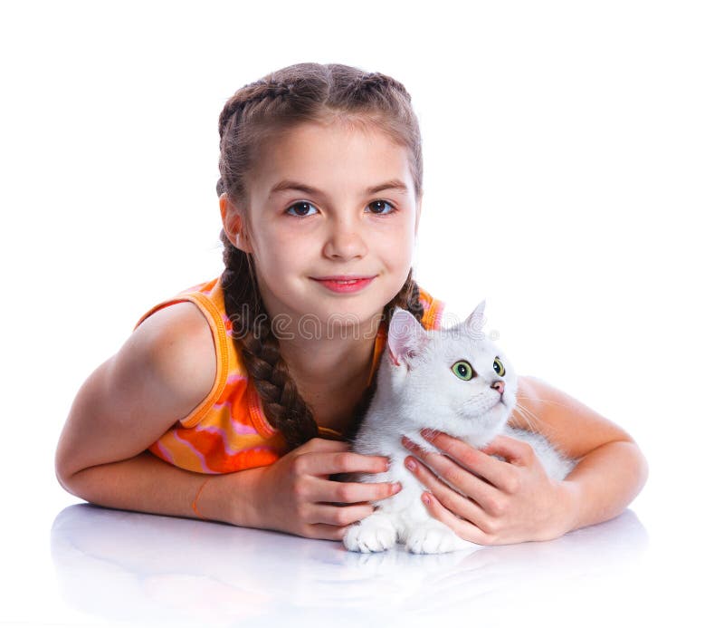 Cute girl with white cat smiling at camera on isolated white background. Cute girl with white cat smiling at camera on isolated white background