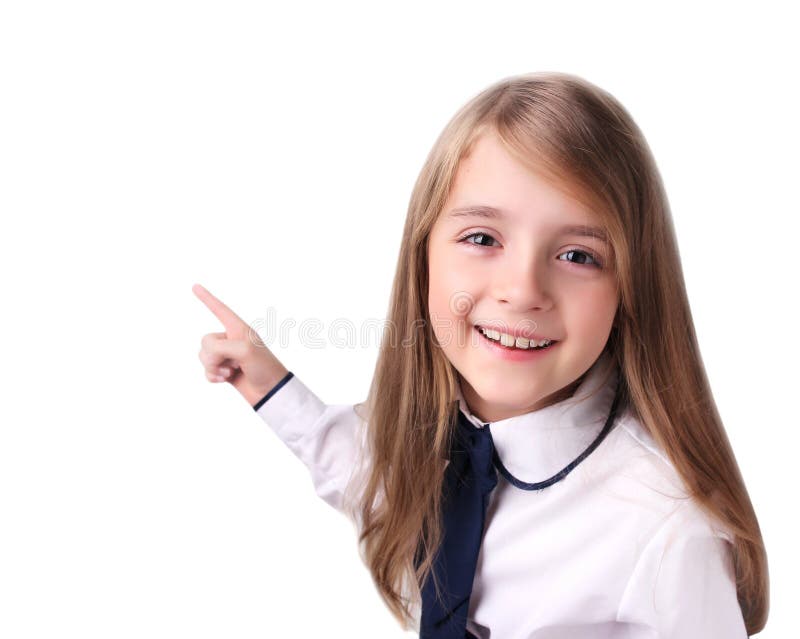 Muchacha del niño que señala en el espacio vacío blanco foto de archivo libre de regalías Muchacha del niño que señala en el espacio vacío blanco foto de archivo libre de regalías