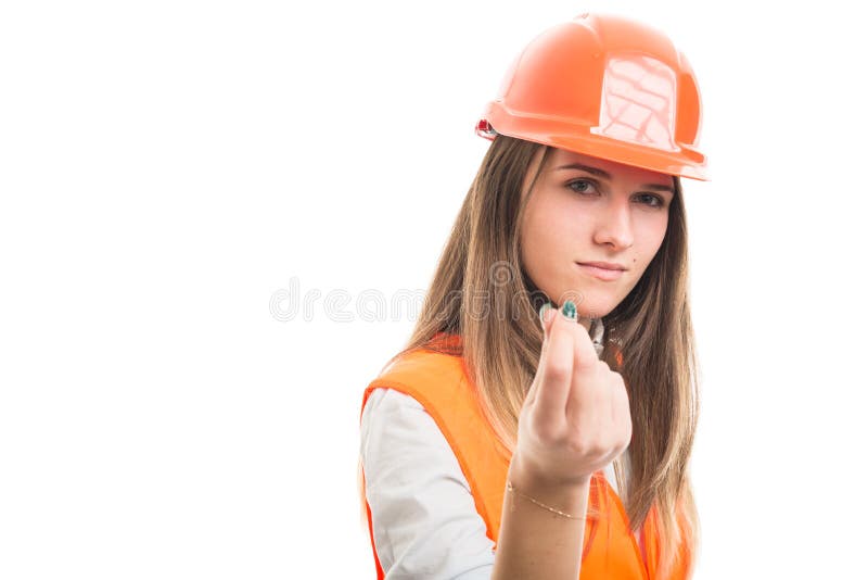 Muchacha hermosa del constructor que hace gesto del dinero imagenes de archivo Muchacha hermosa del constructor que hace gesto del dinero imagenes de archivo