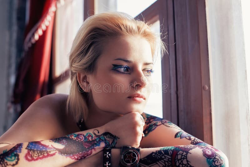 Beautiful blond woman with henna tattoo. Beautiful blond woman with henna tattoo