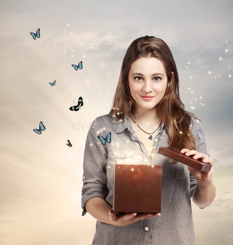 Girl Opening a Magical Giftbox with Butterflies. Girl Opening a Magical Giftbox with Butterflies