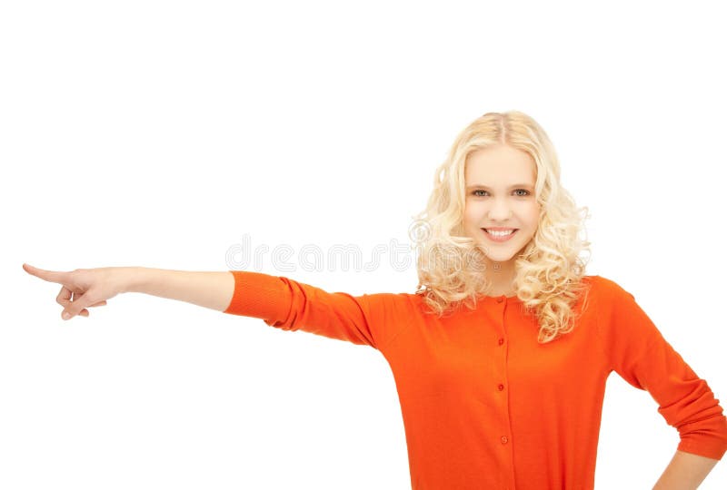 Picture of smiling girl pointing her finger sideways. Picture of smiling girl pointing her finger sideways