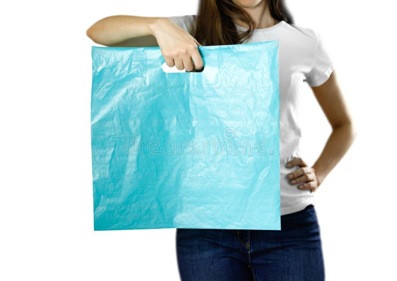 Muchacha que sostiene una bolsa de plástico azul clara Cierre para arriba Fondo aislado fotos de archivo Muchacha que sostiene una bolsa de plástico azul clara Cierre para arriba Fondo aislado fotos de archivo