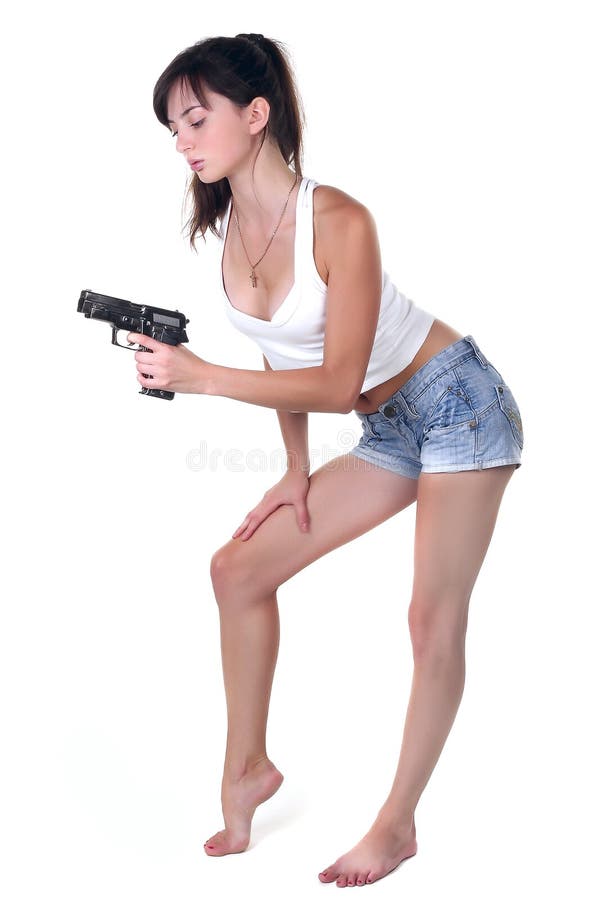 Muchacha sexual con el arma