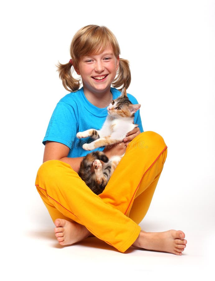 Portrait of a smiling girl with cat. Portrait of a smiling girl with cat.