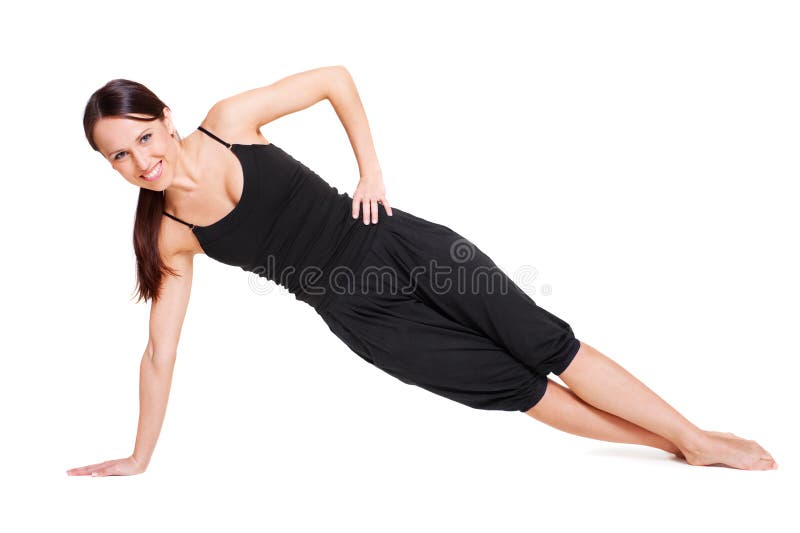 Muchacha sonriente que hace ejercicio fotografía de archivo Muchacha sonriente que hace ejercicio fotografía de archivo