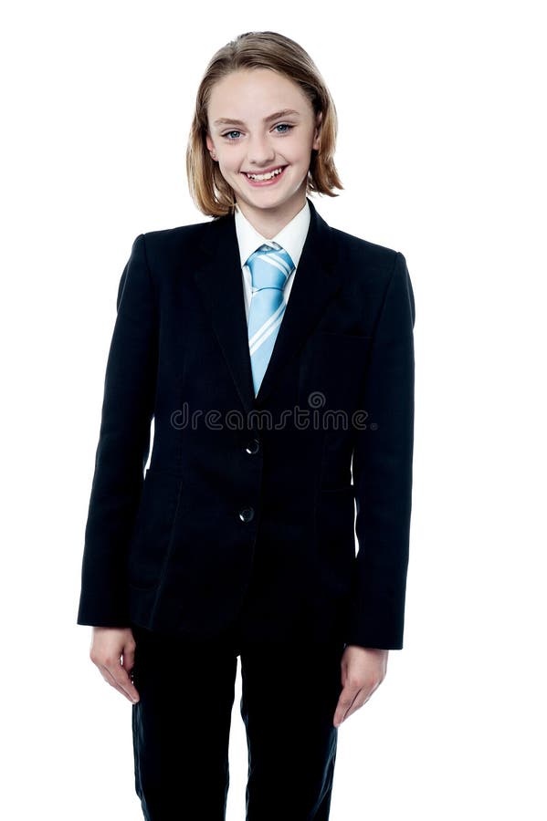 Muchacha sonriente que presenta en traje de negocios imagenes de archivo Muchacha sonriente que presenta en traje de negocios imagenes de archivo