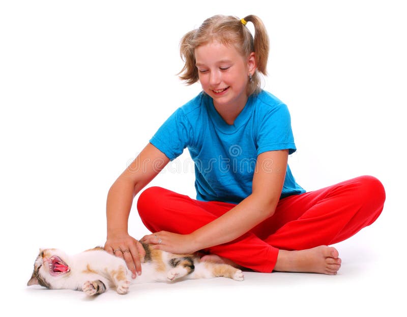Young girl playing with cat. Young girl playing with cat.