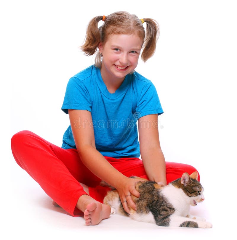 Young girl playing with cat. Young girl playing with cat.