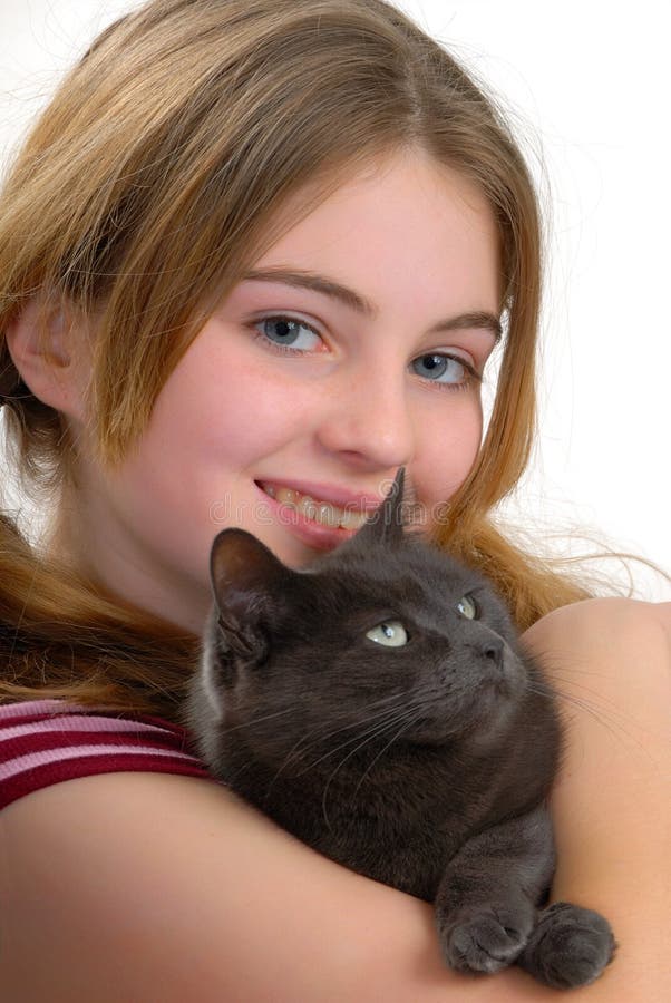Smiling girl with her pet gray cat, isolated on white. Smiling girl with her pet gray cat, isolated on white