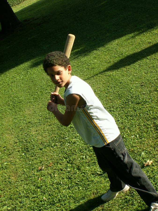 Boy with baseball bat ready for the pitch. Boy with baseball bat ready for the pitch