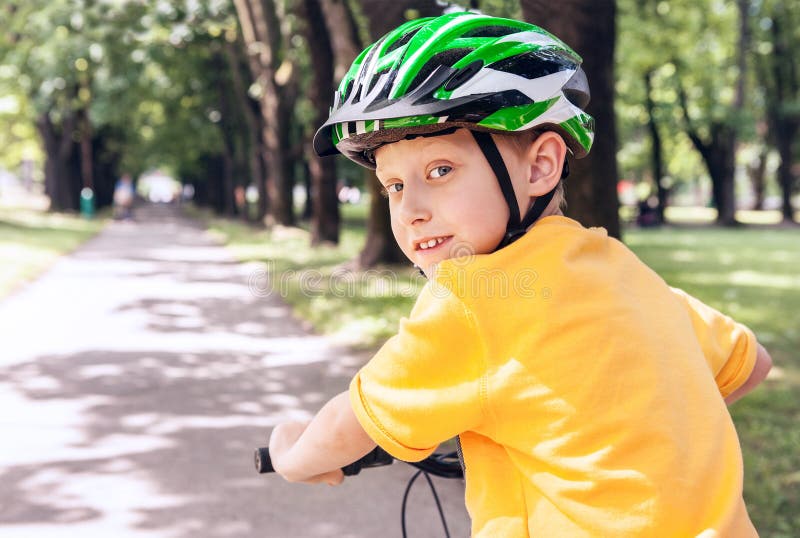 Boy in safe helmet on bicycle. Boy in safe helmet on bicycle