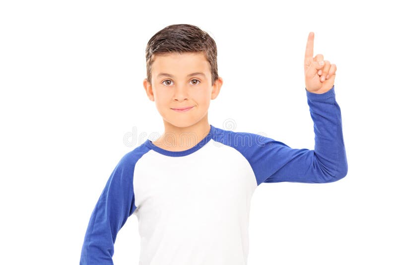 Boy pointing up with a finger isolated on white background. Boy pointing up with a finger isolated on white background