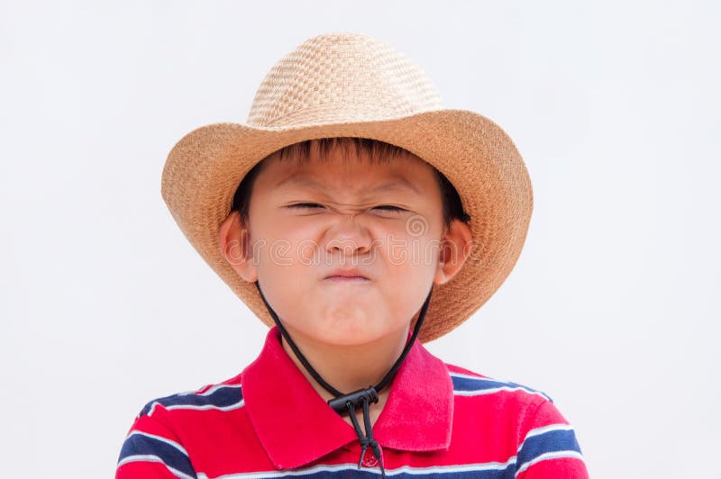 Muchacho que hace una cara disgusted. foto de archivo Muchacho que hace una cara disgusted. foto de archivo
