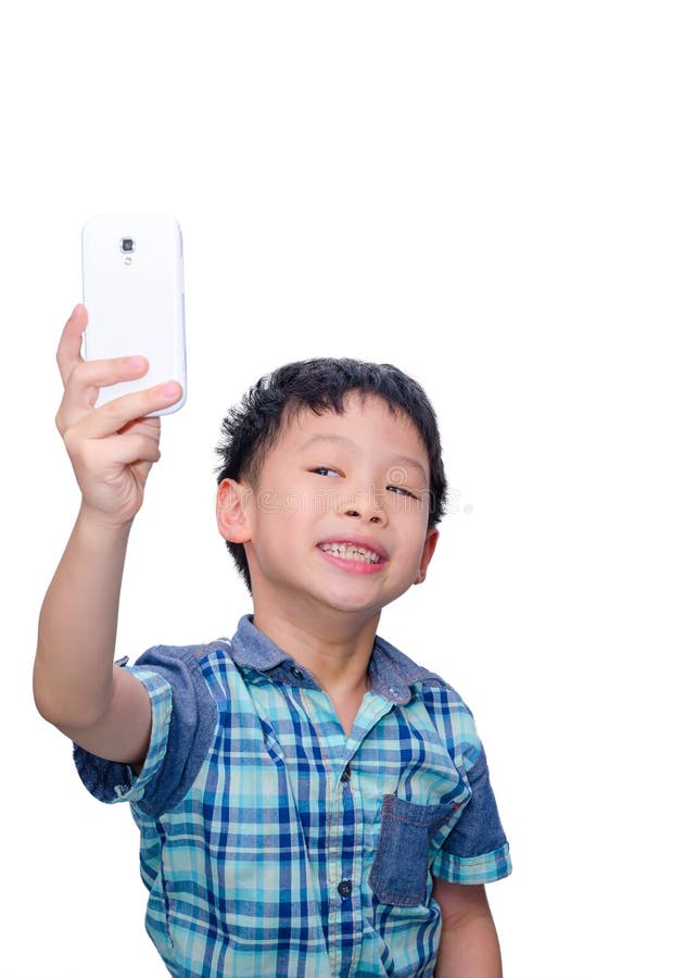 Muchacho que toma la fotografía misma foto de archivo libre de regalías Muchacho que toma la fotografía misma foto de archivo libre de regalías