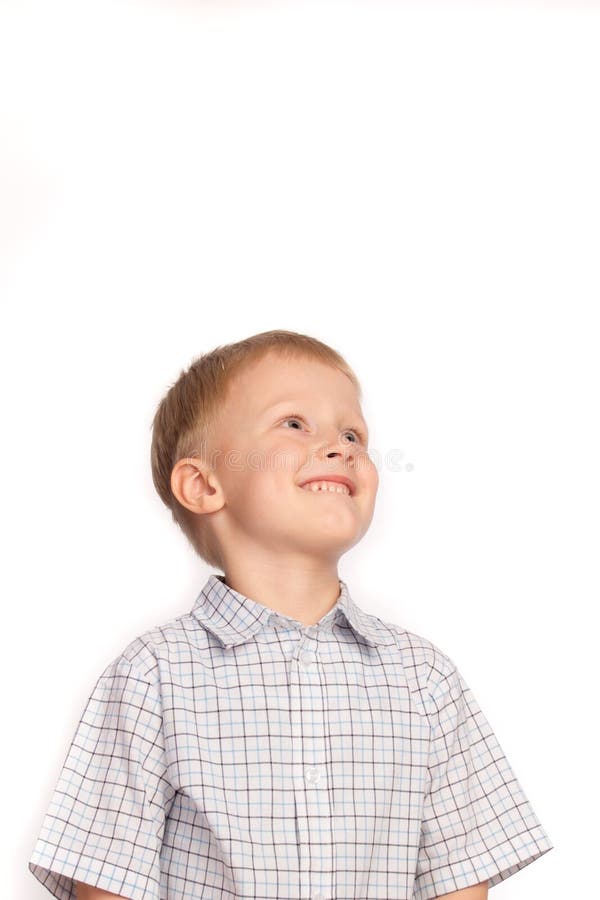 Beautiful happy smiling joyful child (little boy) looking up isolated on white background. Beautiful happy smiling joyful child (little boy) looking up isolated on white background