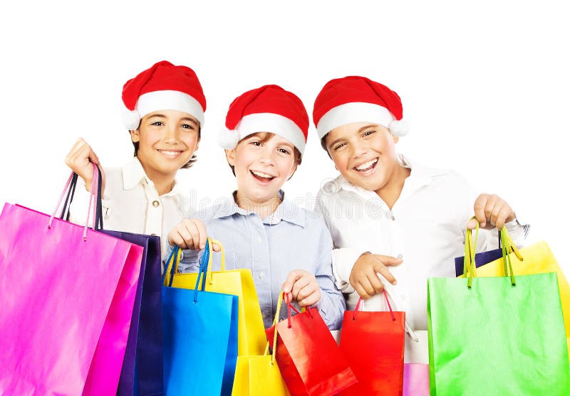 Muchachos felices de Santa con los regalos foto de archivo Muchachos felices de Santa con los regalos foto de archivo