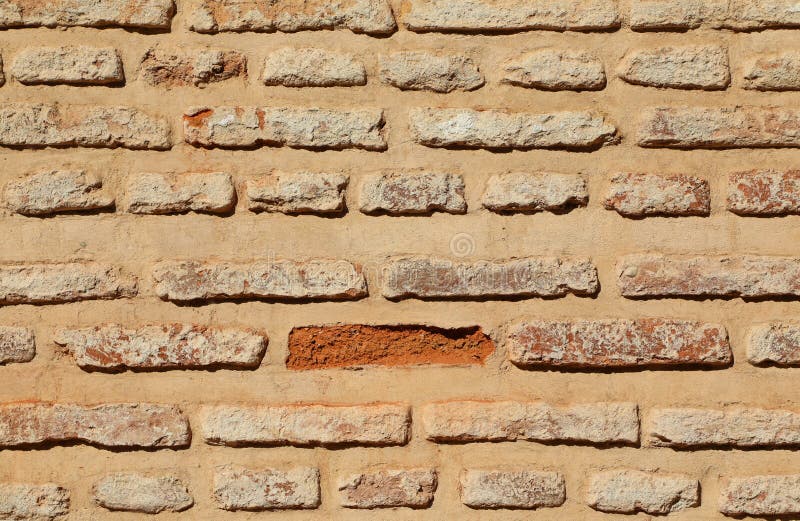 Mud Brick Wall With A Missing Brick Stock Image Image of pattern