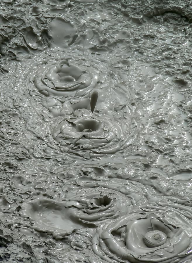 Bubbling, splashing and boiling mud pool, Rotorua, New Zealand stock photos Bubbling, splashing and boiling mud pool, Rotorua, New Zealand stock photos