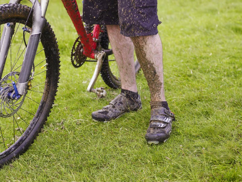 Muddy Cyclist with Bike stock photo. Image of journey 33918108