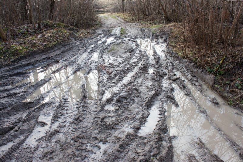 Muddy road royalty free stock images